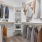 shelving units in bright walk-in closet