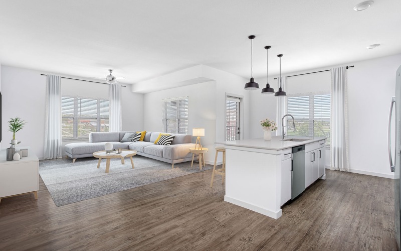 open concept living spaces with ample lighting throughout