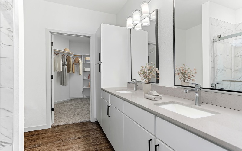 bright, dual sink bathroom