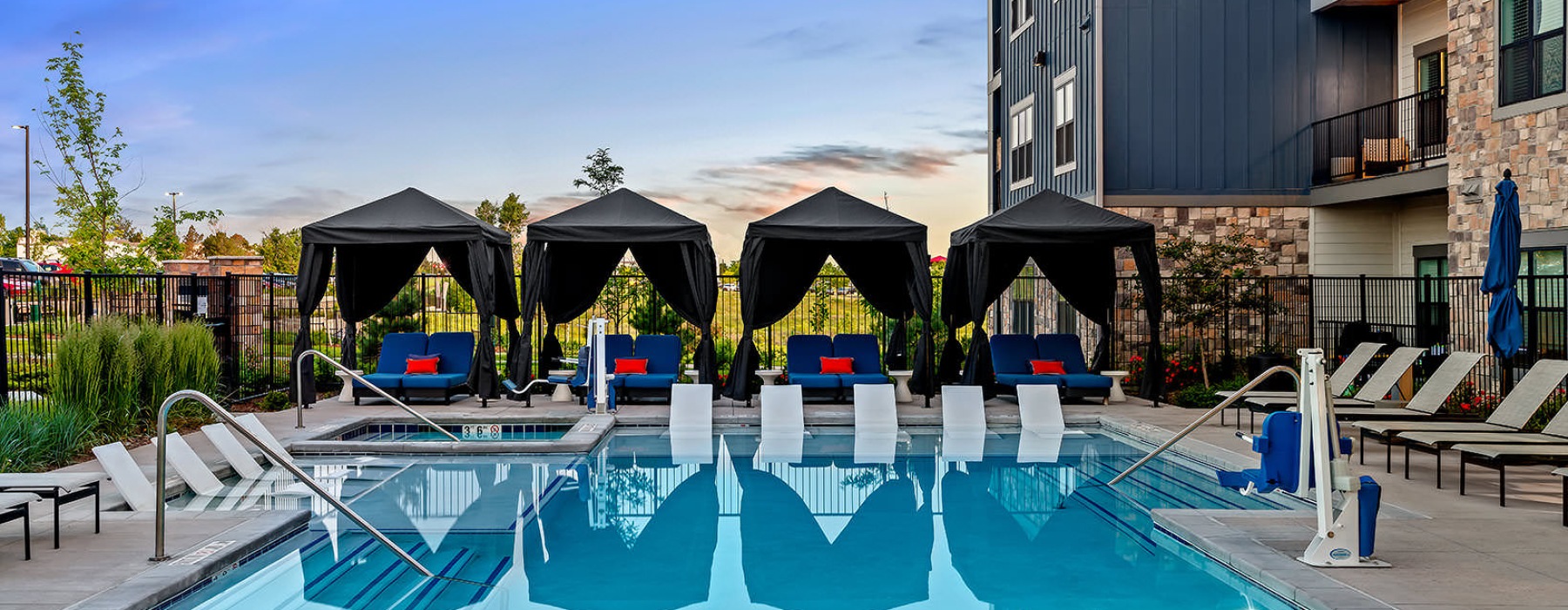 swimming pool and jacuzzi near cabanas